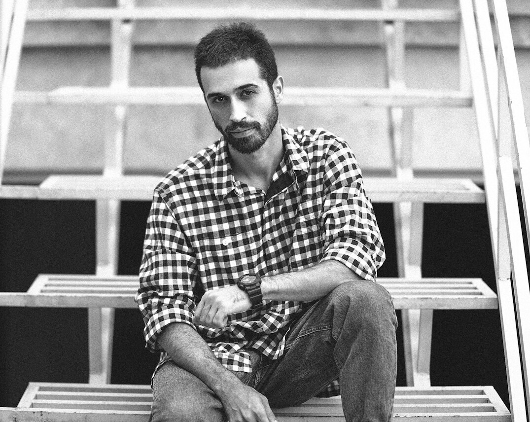 Portrait of a bearded man in a casual shirt